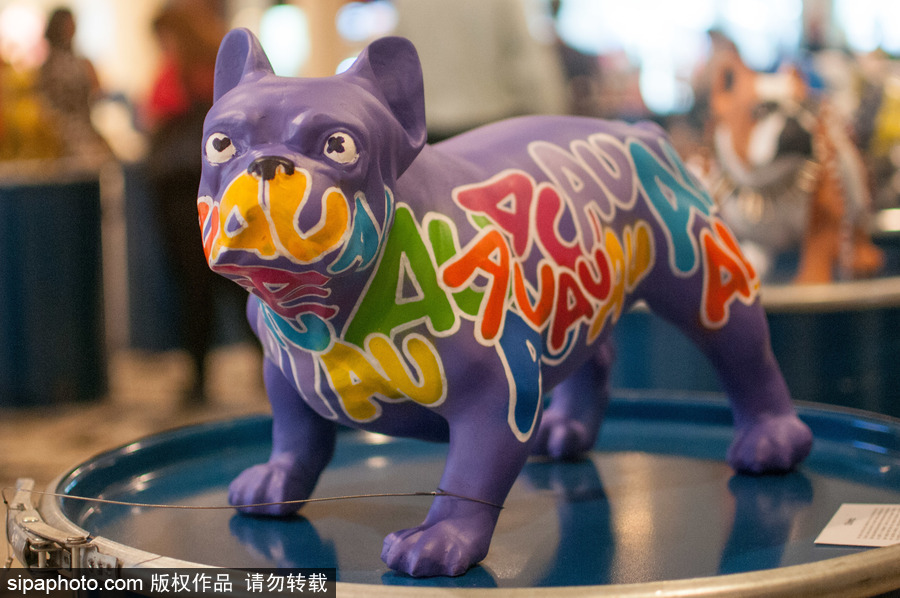 巴西圣保羅舉行狗狗雕塑展 色彩繽紛呆萌可愛(ài)