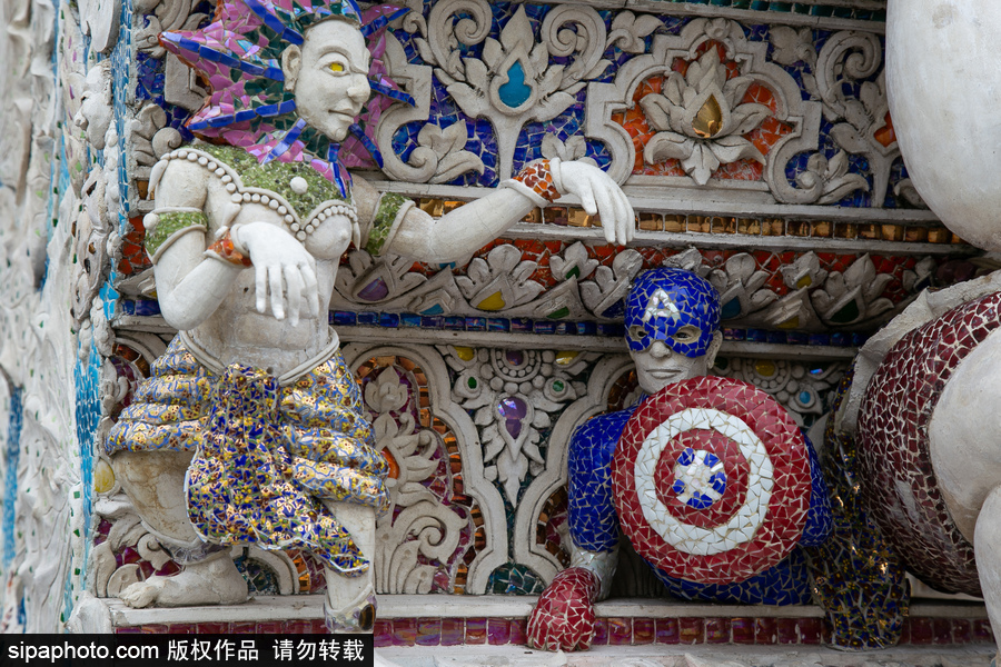 泰國曼谷一廟宇驚現(xiàn)超人、皮卡丘等動(dòng)漫雕像 跨界裝飾創(chuàng)意無窮！
