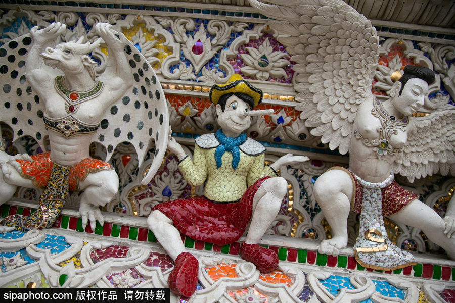 泰國曼谷一廟宇驚現(xiàn)超人、皮卡丘等動漫雕像 跨界裝飾創(chuàng)意無窮！