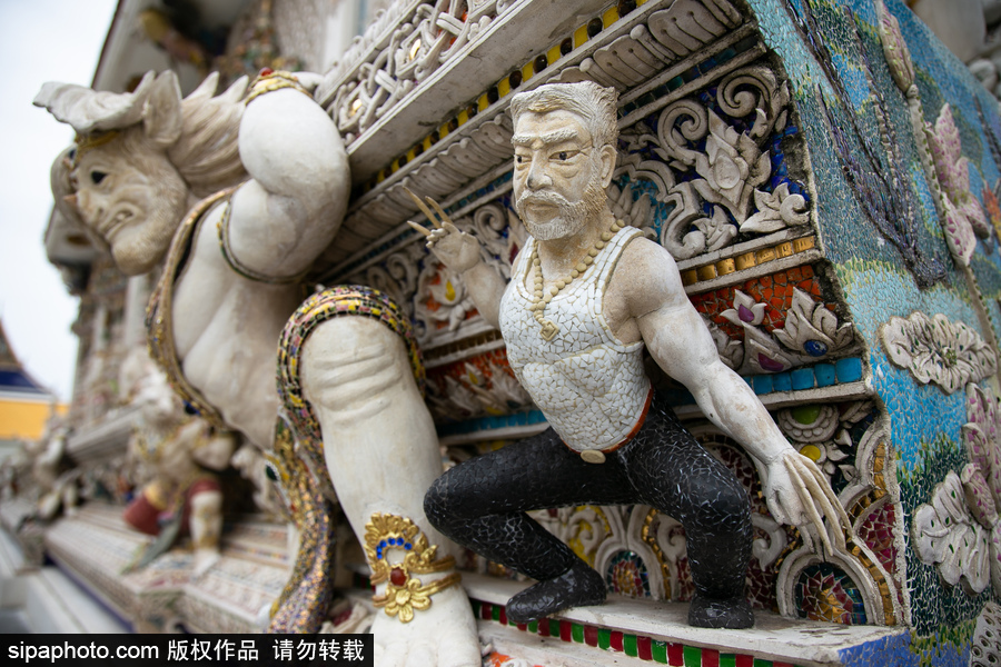 泰國曼谷一廟宇驚現(xiàn)超人、皮卡丘等動(dòng)漫雕像 跨界裝飾創(chuàng)意無窮！