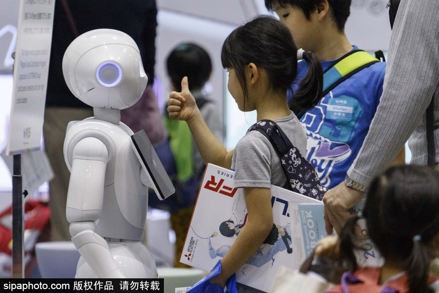 “阿童木”外形機器人吸引眼球！2018年世界機器人峰會在東京舉行